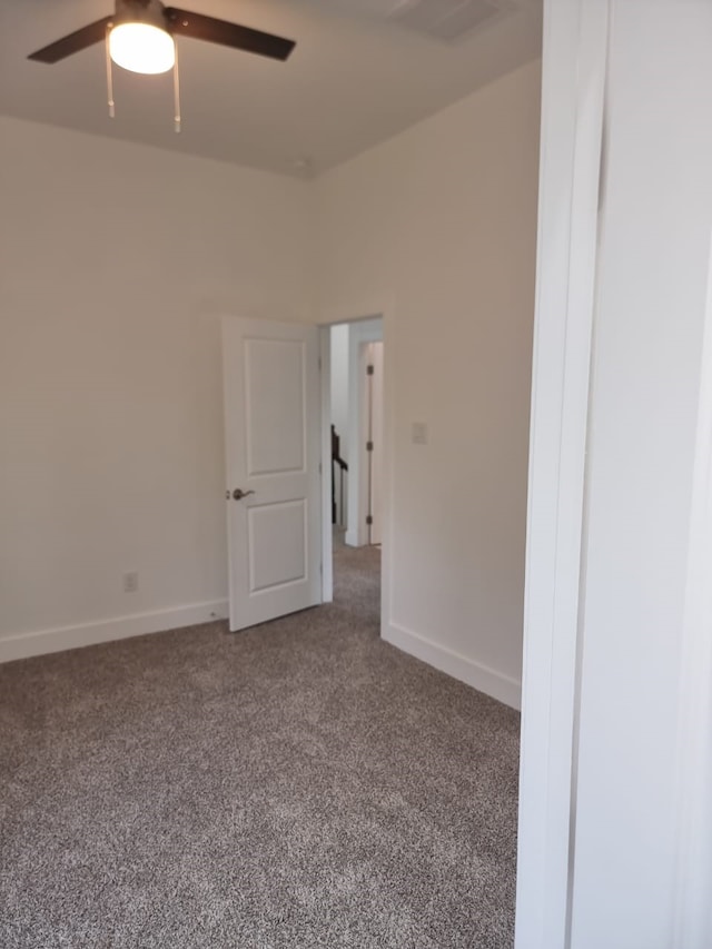 4539 Rosemont St A/B, Unit A/B Houston, TX 77051 - spare room featuring a ceiling fan, carpet floors, and baseboards