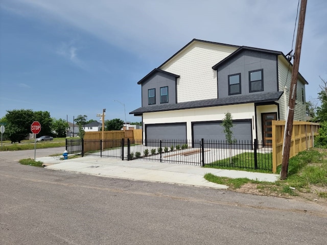 4539 Rosemont St A/B, Unit A/B Houston, TX 77051 - view of front facade with an attached garage and concrete driveway