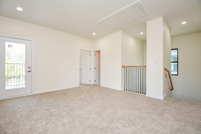 90 Burress St Unit A, Houston, TX 77022 - carpeted spare room with attic access, recessed lighting, and baseboards