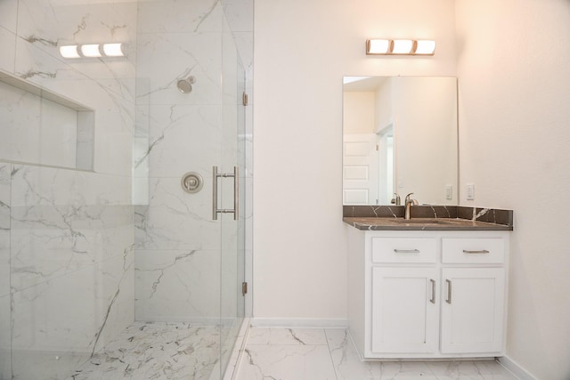 90 Burress St Unit A, Houston, TX 77022 - bathroom featuring marble look tiles, a marble finish shower, baseboards, and vanity