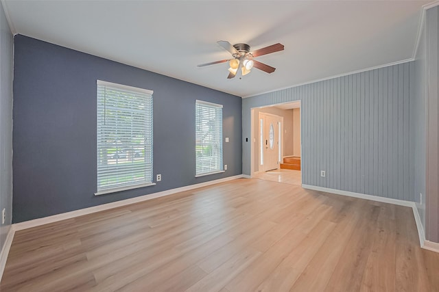 1010 Cheyenne Meadows Dr, Katy, TX 77450 - spare room with a ceiling fan, baseboards, and light wood-type flooring