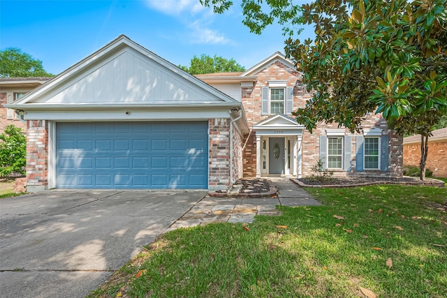1010 Cheyenne Meadows Dr, Katy, TX 77450 - traditional-style home featuring driveway, a garage, a front yard, and brick siding