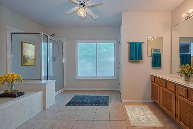 1010 Cheyenne Meadows Dr, Katy, TX 77450 - full bath with a stall shower, tile patterned floors, vanity, and a ceiling fan