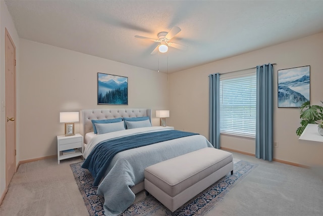 1010 Cheyenne Meadows Dr, Katy, TX 77450 - bedroom featuring light carpet, baseboards, and ceiling fan