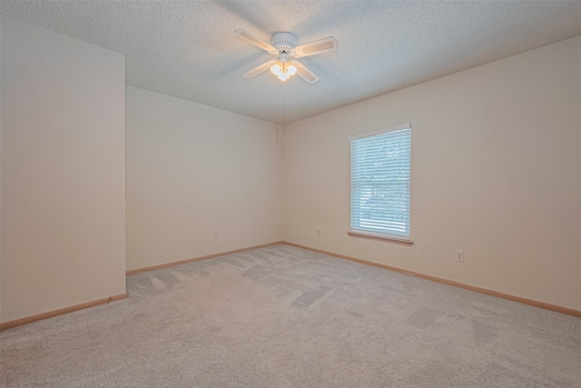 1010 Cheyenne Meadows Dr, Katy, TX 77450 - carpeted empty room featuring ceiling fan, a textured ceiling, and baseboards