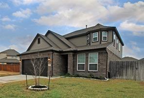 4619 Ehrlich Ct, Rosenberg, TX 77471 - view of front of property with a garage and concrete driveway