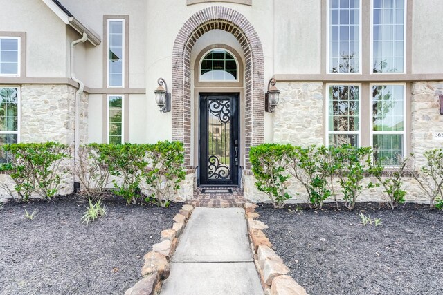 3650 Sage Hollow Dr, Spring, TX 77386 - entrance to property featuring stucco siding and stone siding