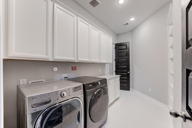 3650 Sage Hollow Dr, Spring, TX 77386 - laundry room featuring cabinet space, independent washer and dryer, recessed lighting, baseboards, and light tile patterned floors