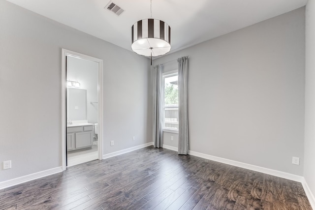 3650 Sage Hollow Dr, Spring, TX 77386 - unfurnished room featuring dark wood-style flooring and baseboards