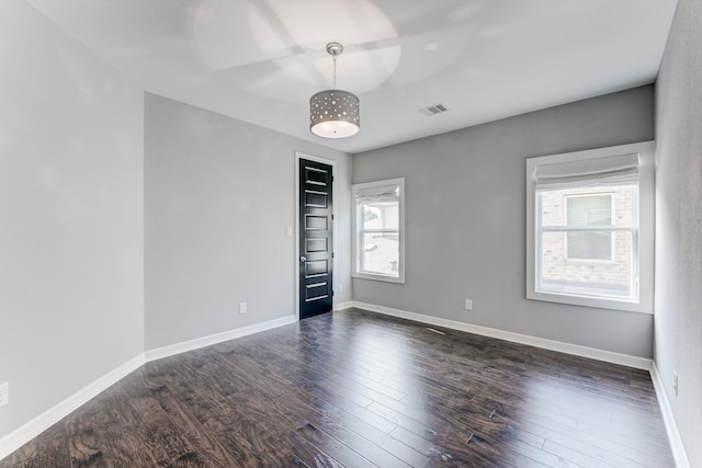 3650 Sage Hollow Dr, Spring, TX 77386 - spare room featuring dark wood-type flooring and baseboards