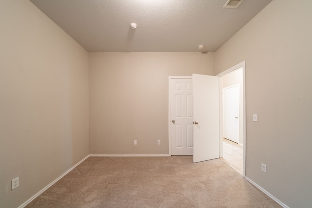 16414 Peyton Stone Cir, Houston, TX 77049 - empty room with light carpet and baseboards