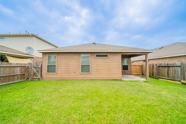 16414 Peyton Stone Cir, Houston, TX 77049 - back of house with a patio area