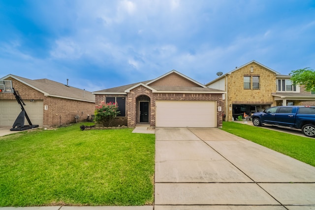 16414 Peyton Stone Cir, Houston, TX 77049 - view of front of property with a front yard, driveway, an attached garage, and brick siding