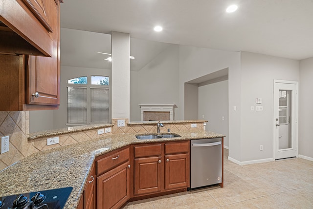 17426 Memorial Blossom Dr, Spring, TX 77379 - kitchen with dishwasher, a sink, backsplash, black electric stovetop, and light stone counters