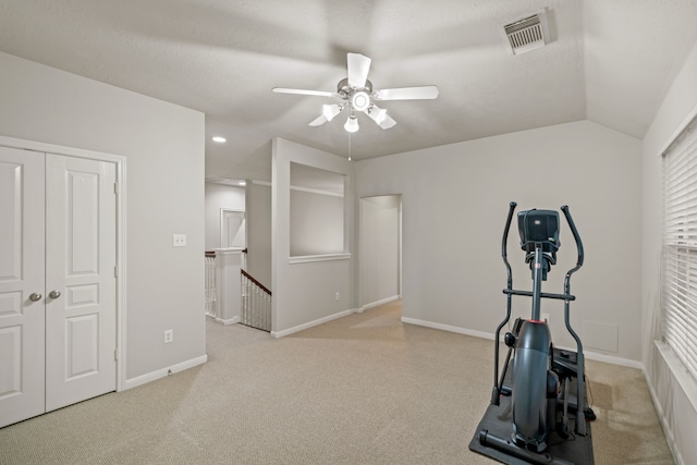 17426 Memorial Blossom Dr, Spring, TX 77379 - exercise room with a ceiling fan, carpet flooring, and baseboards