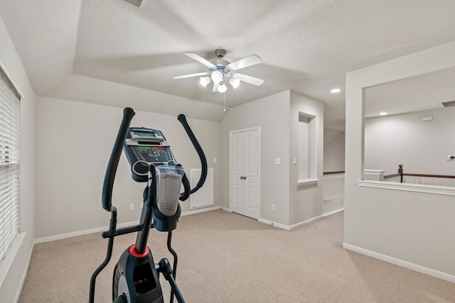 17426 Memorial Blossom Dr, Spring, TX 77379 - exercise area with a ceiling fan, carpet floors, a textured ceiling, baseboards, and recessed lighting