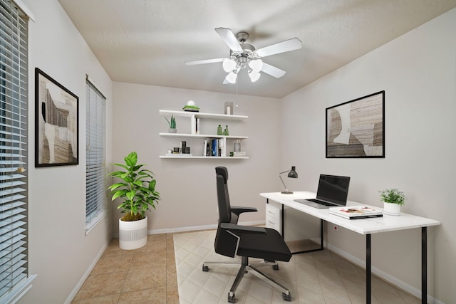 17426 Memorial Blossom Dr, Spring, TX 77379 - office featuring ceiling fan, baseboards, light tile patterned floors, and a textured ceiling