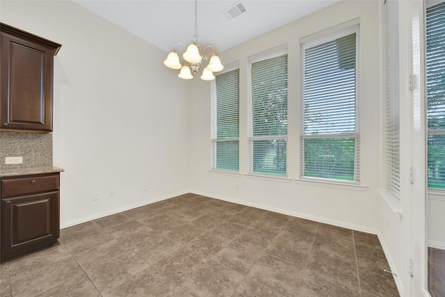 10938 Glenrothers Dr, Richmond, TX 77407 - unfurnished dining area with healthy amount of natural light and a chandelier