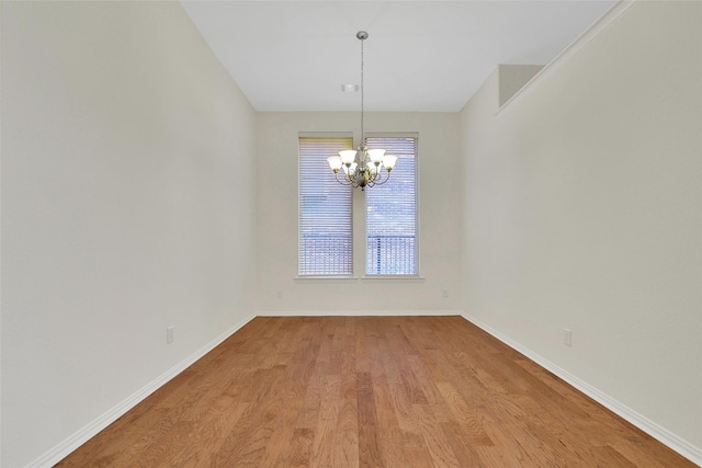 10938 Glenrothers Dr, Richmond, TX 77407 - unfurnished dining area featuring a chandelier and light wood-type flooring