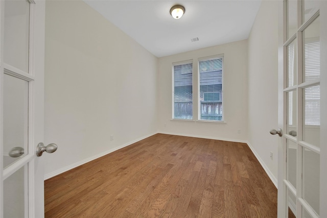 10938 Glenrothers Dr, Richmond, TX 77407 - empty room featuring light wood-style flooring and baseboards
