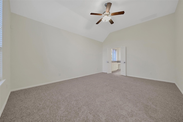 10938 Glenrothers Dr, Richmond, TX 77407 - carpeted spare room featuring vaulted ceiling and a ceiling fan