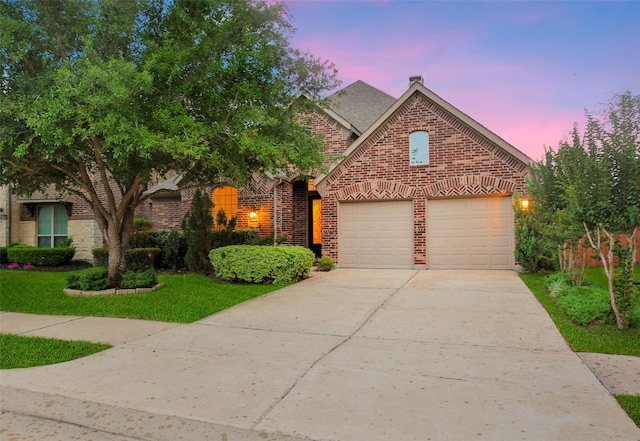 10938 Glenrothers Dr, Richmond, TX 77407 - traditional-style home featuring brick siding, driveway, and an attached garage