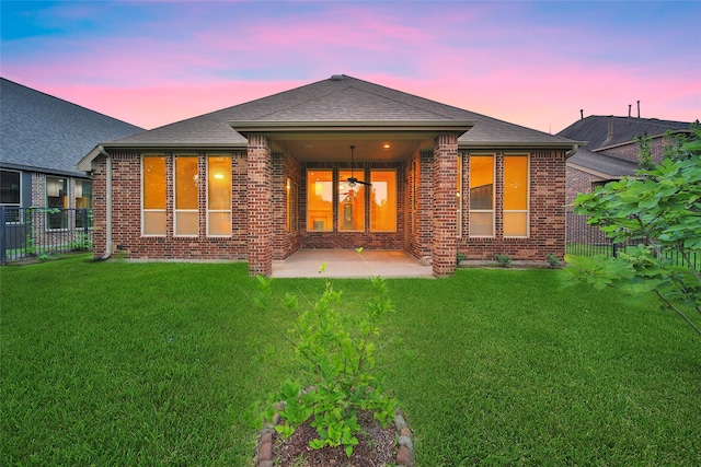 10938 Glenrothers Dr, Richmond, TX 77407 - back of house with brick siding, a patio area, and a shingled roof