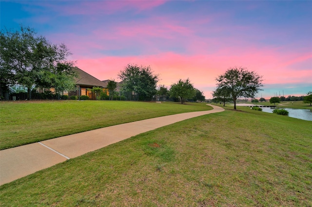 10938 Glenrothers Dr, Richmond, TX 77407 - surrounding community featuring a water view and a lawn