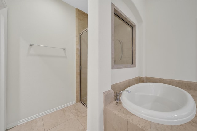 10938 Glenrothers Dr, Richmond, TX 77407 - full bathroom with a bath, a shower stall, and tile patterned floors