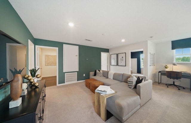 25319 Merino Dr, Magnolia, TX 77355 - living area with light carpet, recessed lighting, and baseboards