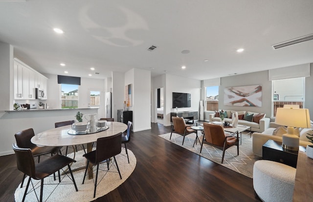 25319 Merino Dr, Magnolia, TX 77355 - dining area featuring dark wood finished floors, recessed lighting, and baseboards