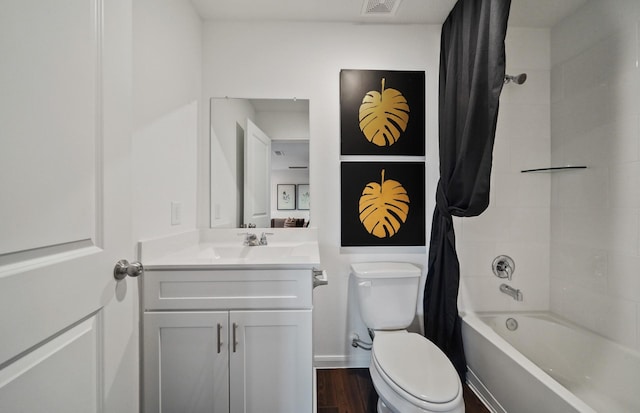 25319 Merino Dr, Magnolia, TX 77355 - full bathroom with toilet, vanity, shower / bath combo, and wood finished floors