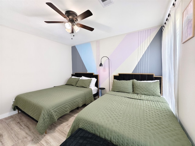 11810 Sagedowne Ln, Houston, TX 77089 - bedroom with wood finished floors and a ceiling fan