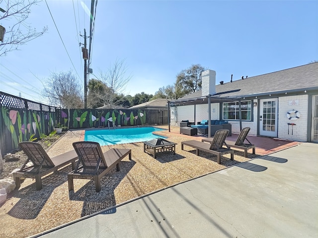 11810 Sagedowne Ln, Houston, TX 77089 - view of swimming pool with an outdoor hangout area, a patio, and a fenced backyard