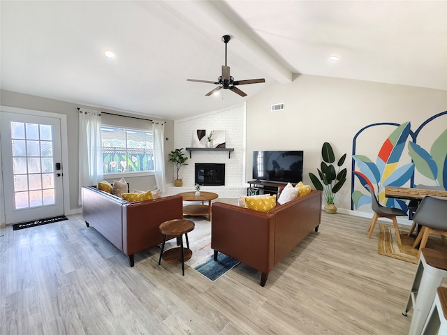 11810 Sagedowne Ln, Houston, TX 77089 - living room featuring ceiling fan, light wood-type flooring, and a fireplace