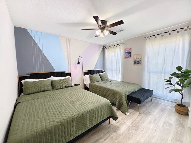 11810 Sagedowne Ln, Houston, TX 77089 - bedroom with wood finished floors and a ceiling fan