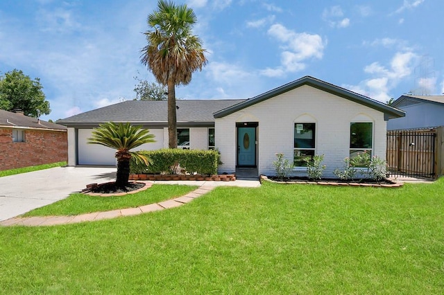 11810 Sagedowne Ln, Houston, TX 77089 - ranch-style house with driveway, a front lawn, a garage, and brick siding