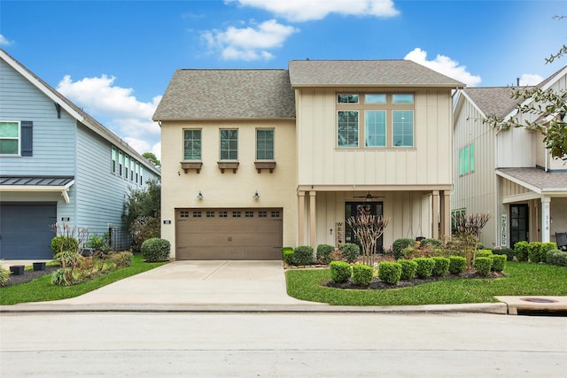 118 Grant Cove Dr, Montgomery, TX 77316 - view of front of property with board and batten siding, concrete driveway, an attached garage, and a shingled roof