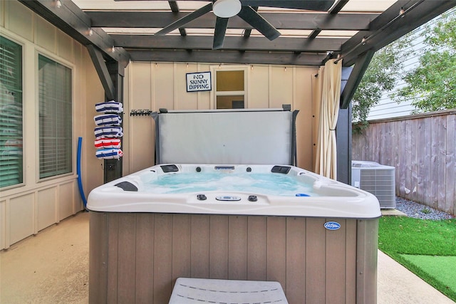 118 Grant Cove Dr, Montgomery, TX 77316 - view of patio featuring central air condition unit, a ceiling fan, and a hot tub