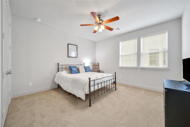 118 Grant Cove Dr, Montgomery, TX 77316 - bedroom featuring light carpet, baseboards, and a ceiling fan
