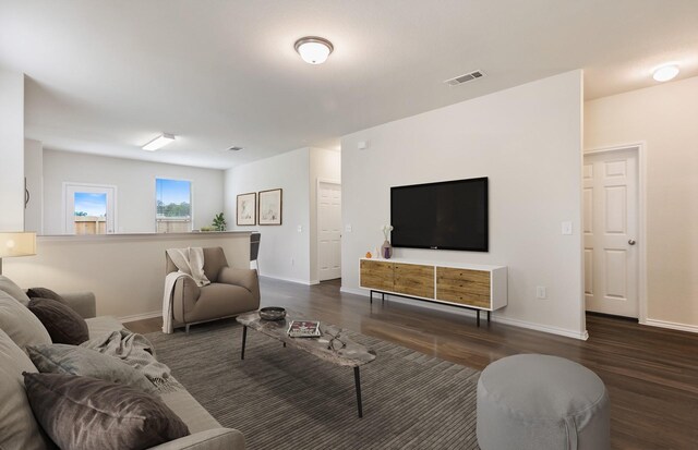 25323 Merino Dr, Magnolia, TX 77355 - living room featuring dark wood finished floors and baseboards
