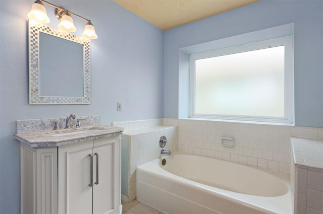 414 Enfield Dr, Highlands, TX 77562 - full bath featuring vanity and a garden tub