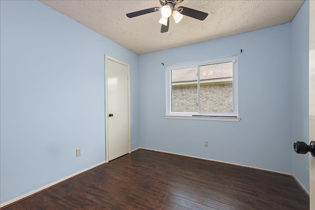 414 Enfield Dr, Highlands, TX 77562 - empty room with wood finished floors, ceiling fan, baseboards, and a textured ceiling