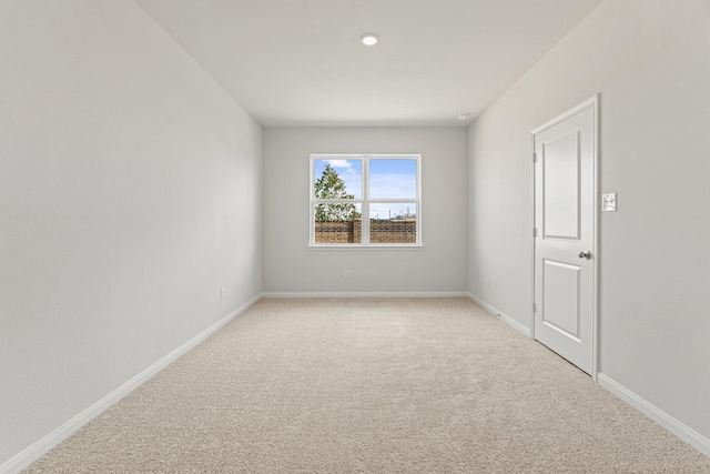 7606 Thrips Ln, Richmond, TX 77469 - unfurnished room featuring light colored carpet and baseboards