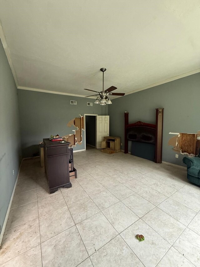 15125 S Dr, Channelview, TX 77530 - living room with ceiling fan, ornamental molding, baseboards, and light tile patterned flooring