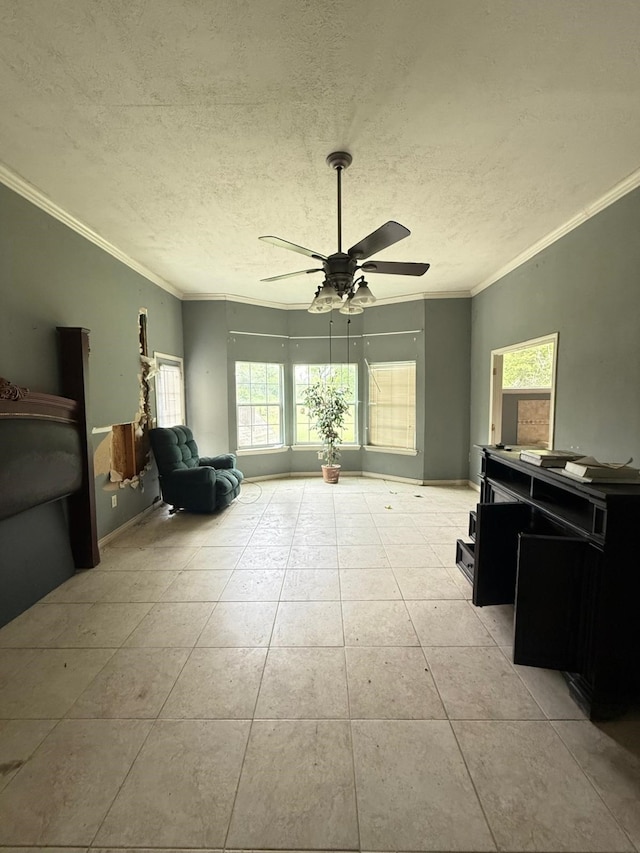 15125 S Dr, Channelview, TX 77530 - living area with plenty of natural light, a ceiling fan, crown molding, light tile patterned floors, and a textured ceiling
