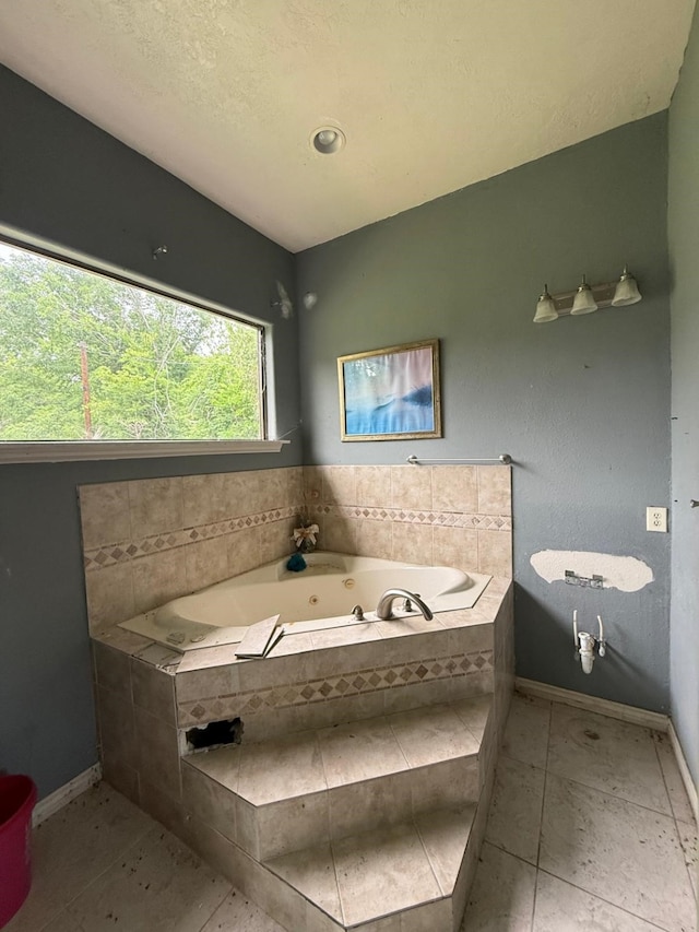 15125 S Dr, Channelview, TX 77530 - full bath with a whirlpool tub and baseboards