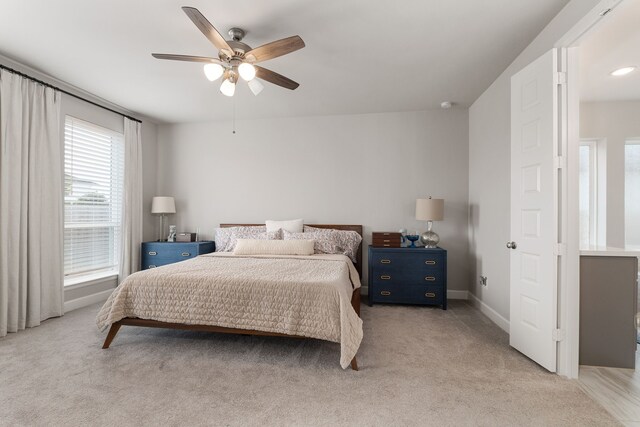 1918 Longcroft Ln, Katy, TX 77493 - bedroom featuring light colored carpet, ceiling fan, and baseboards