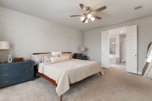 1918 Longcroft Ln, Katy, TX 77493 - bedroom featuring light colored carpet, connected bathroom, a ceiling fan, and baseboards