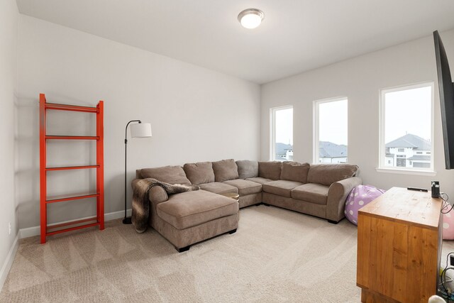 1918 Longcroft Ln, Katy, TX 77493 - living area featuring light colored carpet and baseboards